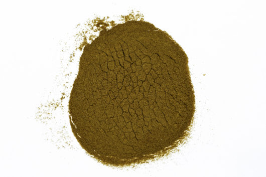 A top down view of a small pile of Eschscholzia californica (California Poppy) 20x powder extract.